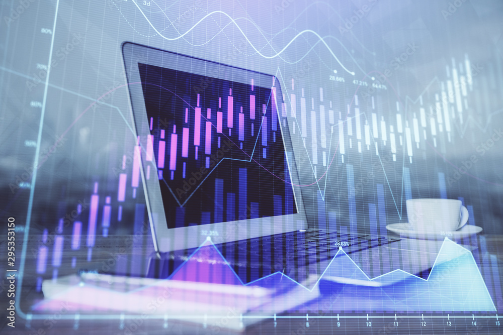 Forex market chart hologram and personal computer background. Double exposure. Concept of investment. Forex market chart hologram and personal computer background. Double exposure. Concept of investment.
