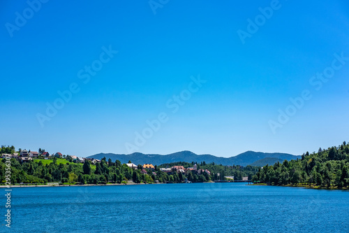Panoramic view of town of Fuzine on Lake Bajer, Gorski kotar, Croatia on sunny summer day