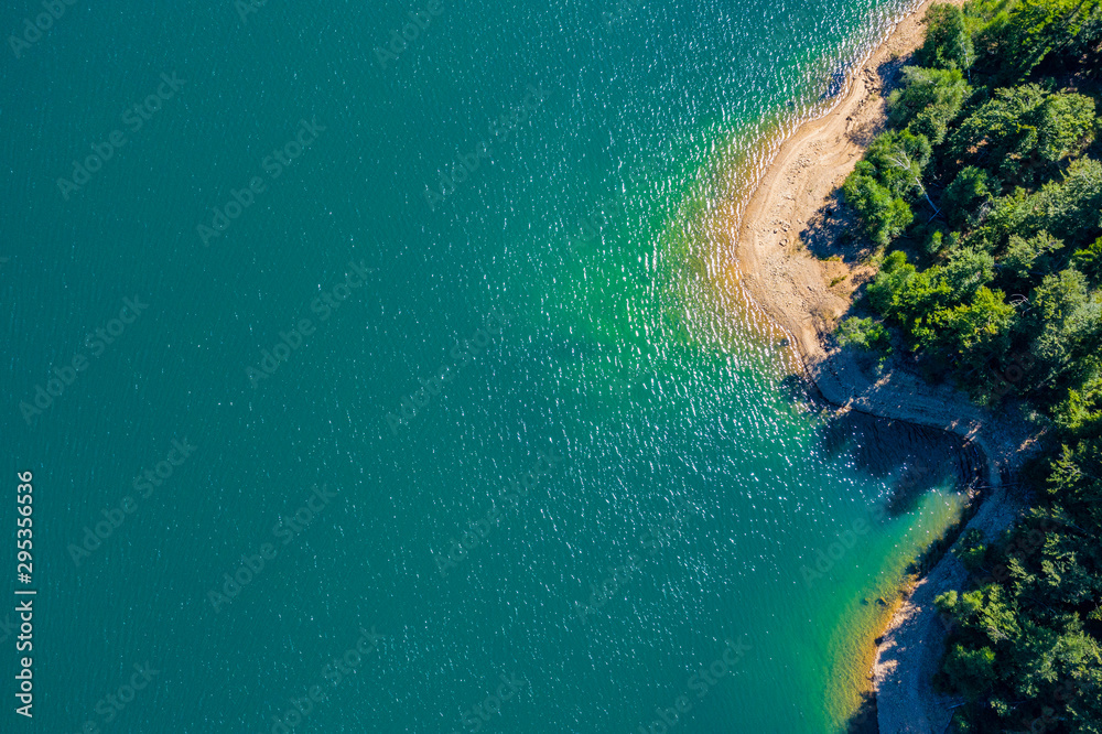 - Aerial panoramic view of Lokvarsko Lake, beautiful mountain landscape on sunny summer day, Lokve, Gorski kotar, Croatia