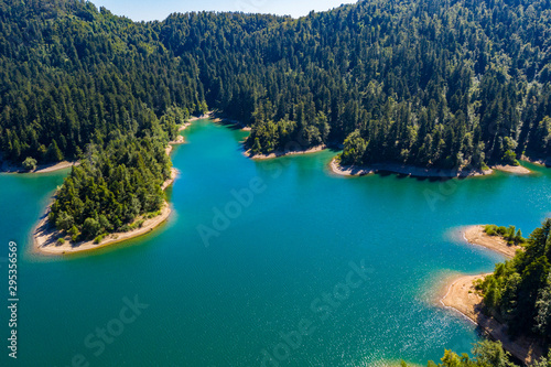 Aerial panoramic view of Lokvarsko Lake, beautiful mountain landscape on sunny summer day, Lokve, Gorski kotar, Croatia