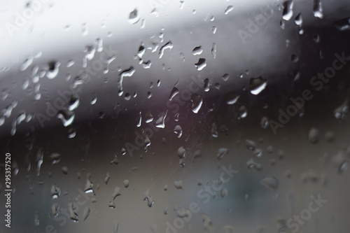 wet window with rain drops, macro image.