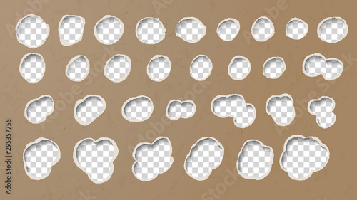 Bullet holes in a cardboard background made with a shotgun ammo.