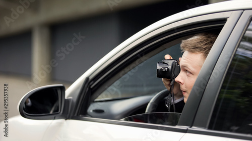 Reporter secretly taking photo sitting in auto, spying paparazzi, exclusive