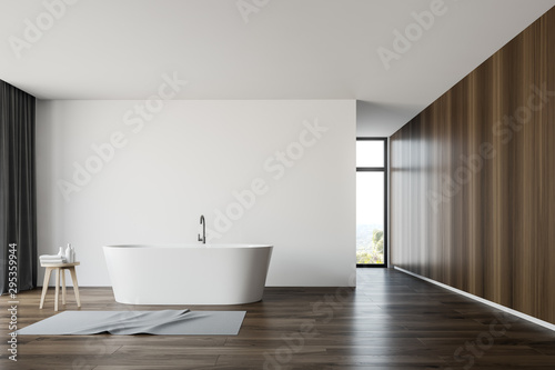 Spacious white and wooden bathroom interior