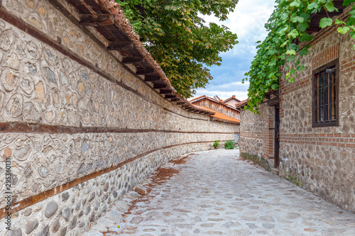 One of the ancient streets in the Old town - Bansko, Bulgaria photo