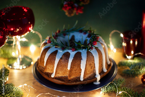 Christmas traditional pie close up. Festive food with winter holidays decoration on the table 