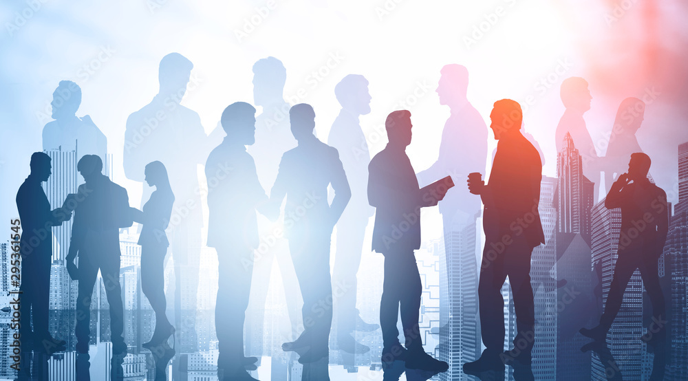 © ImageFlow - Diverse business people in city. Teamwork