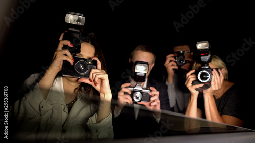 Paparazzi making shoots, pov of celebrity sitting in car, arriving to event photo