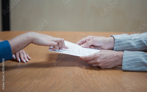 young HR woman interviews a candidate for a job.