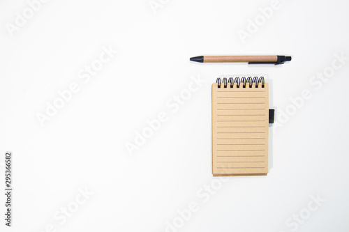 Brown notebook in white background