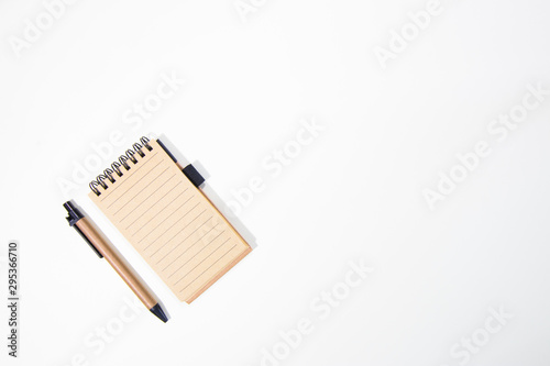Brown notebook in white background