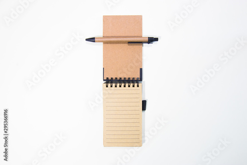 Brown notebook in white background