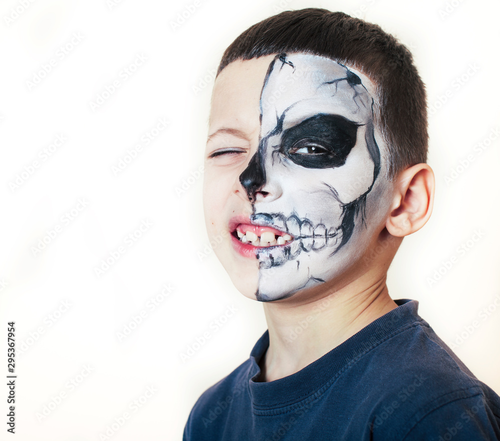 Little cute boy with facepaint like skeleton to celebrate halloween,  lifestyle people concept, children on holiday Stock Photo by ©iordani  409557226