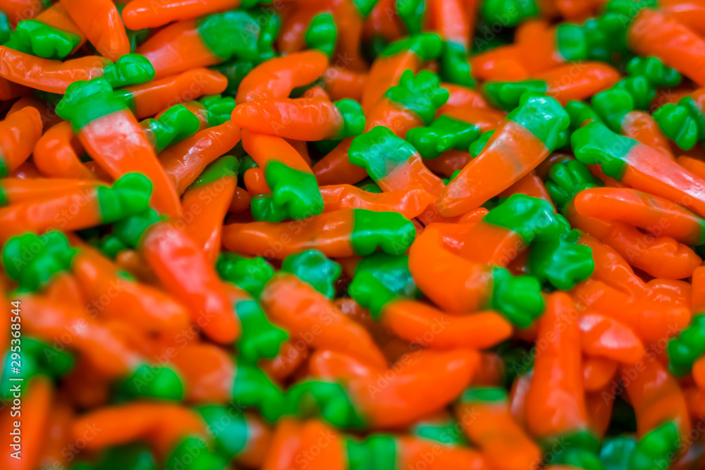 Background - assortment of delicious marmalade jelly candies for sale on counter of shop, grocery, market, cafe. Dessert, copy space, sweet food, pattern and confectionery concept Background - assortment of delicious marmalade jelly candies for sale on counter of shop, grocery, market, cafe. Dessert, copy space, sweet food, pattern and confectionery concept