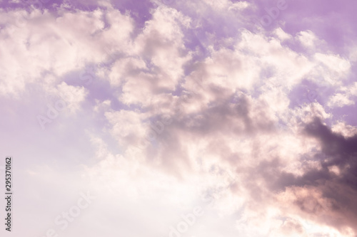 the sky with blue and pink shades with white clouds