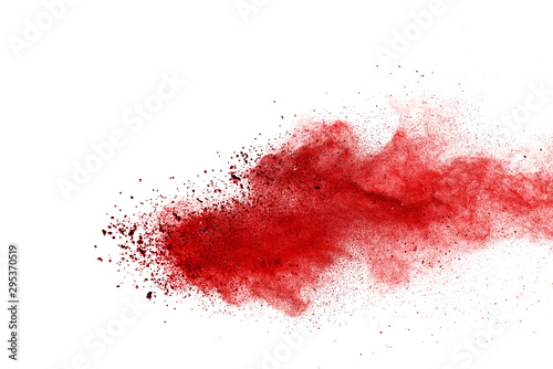 Red powder explosion on white background. Colored cloud. Colorful dust explode. Paint Holi.