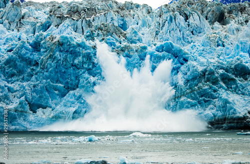 Explosion of Frigid Water from Calving Glacier