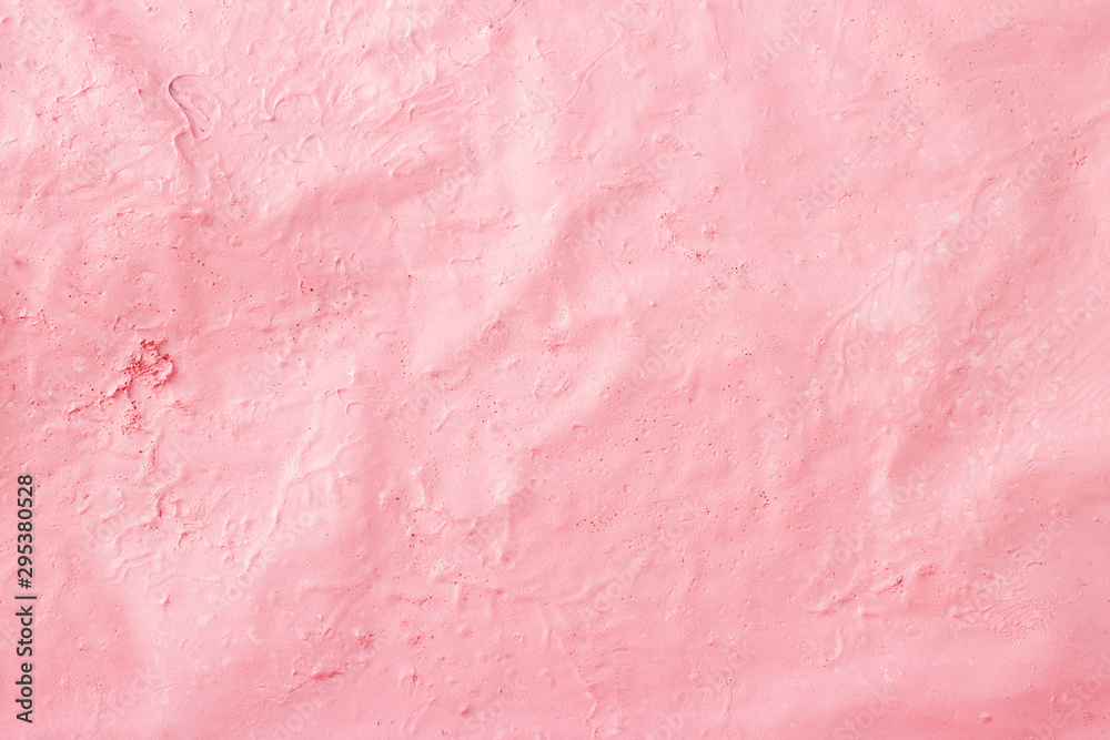 Abstract pink coral gradient background. Pink paint is applied to the surface. Copy space Abstract pink coral gradient background. Pink paint is applied to the surface. Copy space