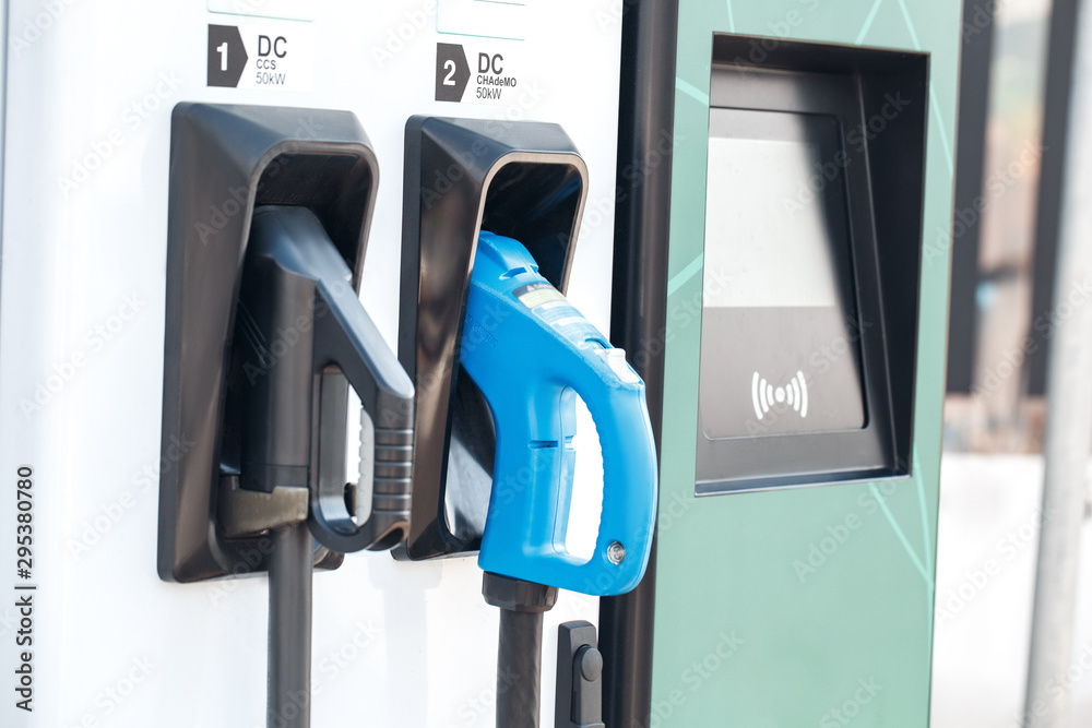 Public charging station for electric car with different types power cable supply Public charging station for electric car with different types power cable supply