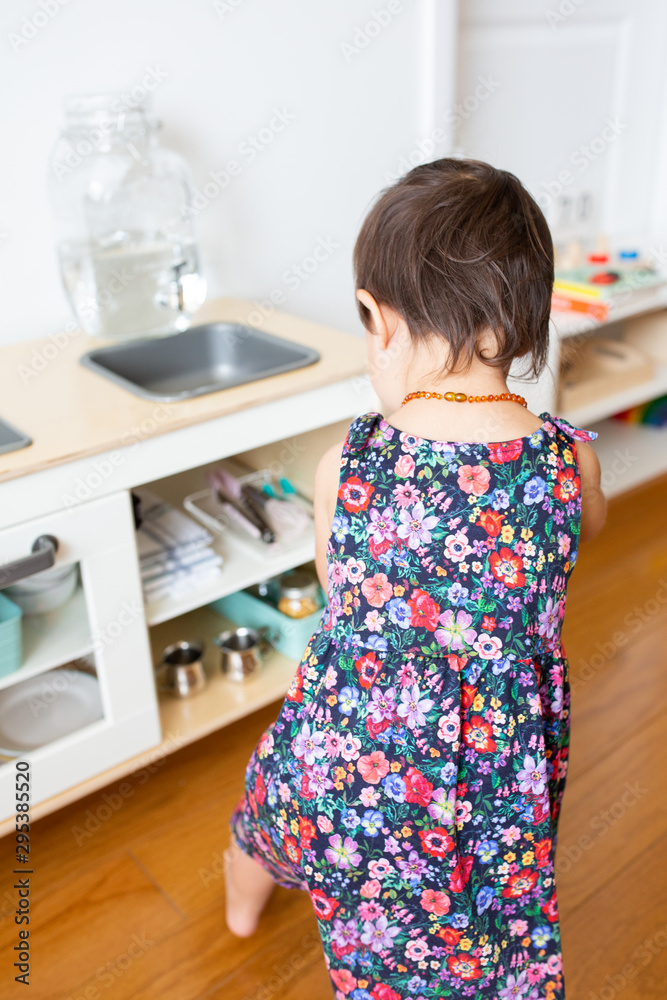 Toddler Girl with Play Kitchen Toddler Girl with Play Kitchen
