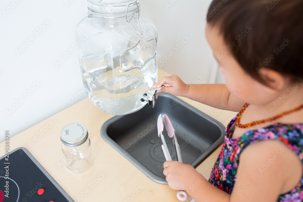 Toddler Girl with Play Kitchen