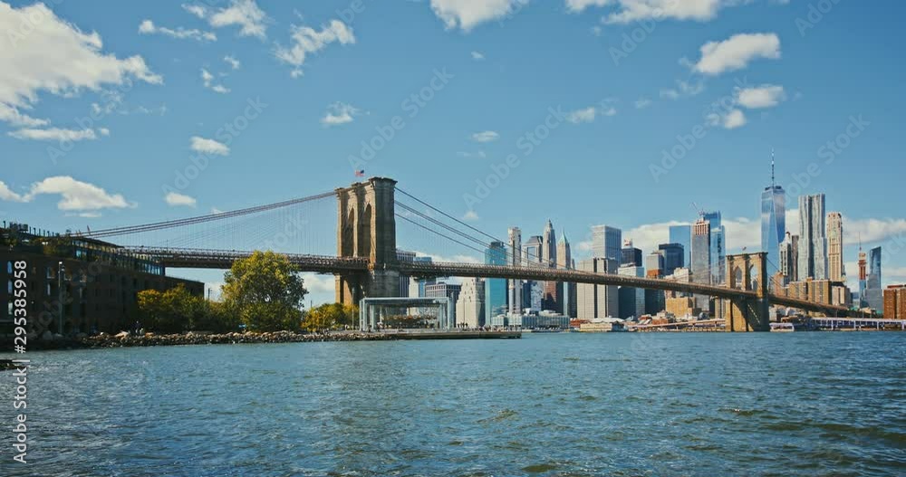 Brooklyn bridge during sunset over Manhattan with Cityscape of New York, USA. 4K time lapse Brooklyn bridge during sunset over Manhattan with Cityscape of New York, USA. 4K time lapse