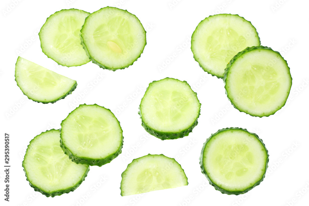 fresh cucumber slices isolated on white background. top view fresh cucumber slices isolated on white background. top view