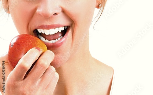 woman eating a delicious apple stock photo