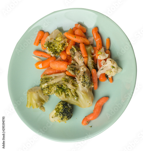 provencal vegetables on a plate.grilled vegetables on a plate isolated on white background.broccoli and carrots on a plate top view.healthy food