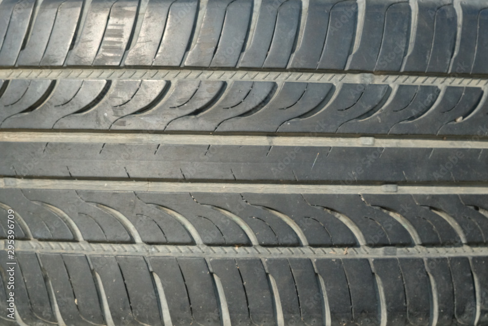 Old tires stacked, Close-up Broken tire damaged, A bunch of old tires from used cars. Environmental pollution. Dump tires Old tires stacked, Close-up Broken tire damaged, A bunch of old tires from used cars. Environmental pollution. Dump tires