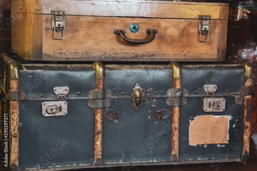 very old suitcases standing in a row