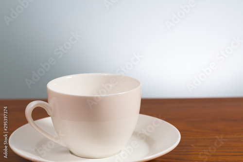 Empty coffee mug on wooden table