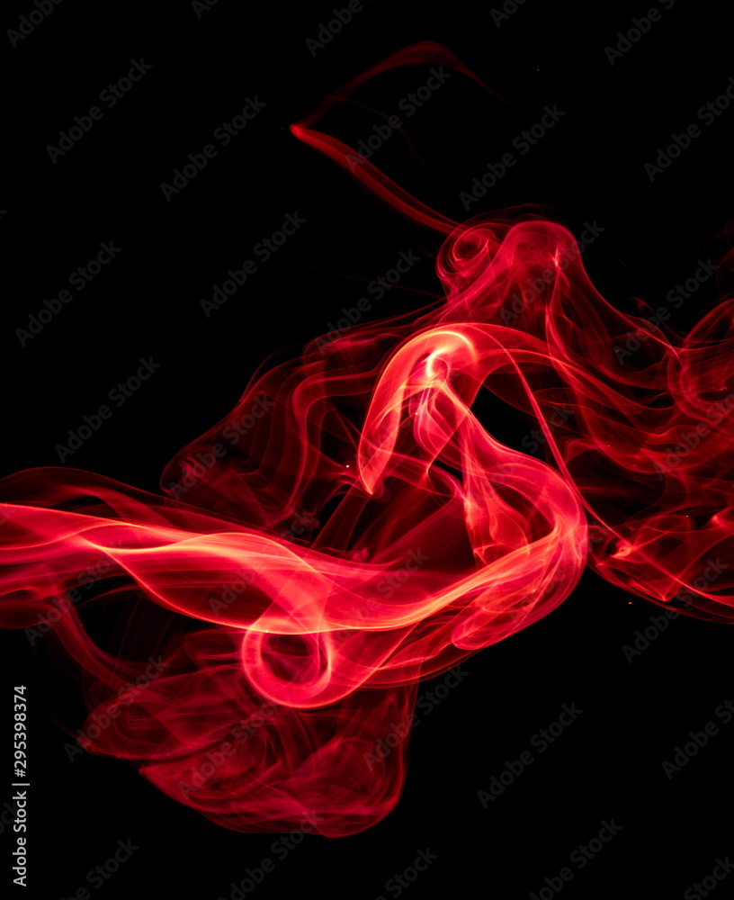Obraz premium Red smoke on black background