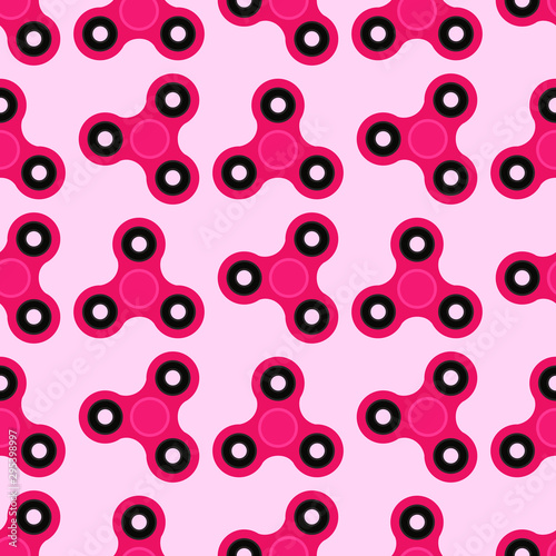 Fidget spinner. Hand toy for stress relief. Seamless pattern with pink spinners for wrapping paper, wallpaper, web page background and more. Vector illustration. EPS10.
