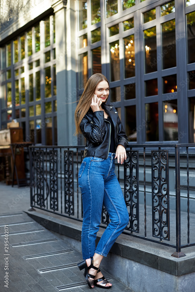 Face portrait of attractive woman in black leather jacket Face portrait of attractive woman in black leather jacket