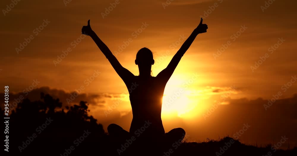 Winning, success and life goals concept. Young woman with arms in the air giving thumbs up. Winning, success and life goals concept. Young woman with arms in the air giving thumbs up.