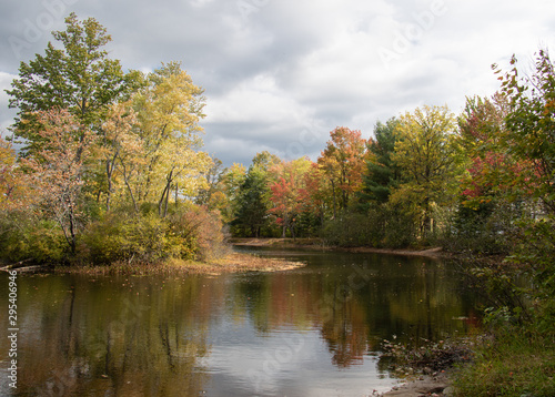 Wallpaper Mural Dark sky over a pond  on an autumn day Torontodigital.ca