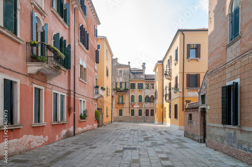 Urban cityscape with empty street and historic old houses