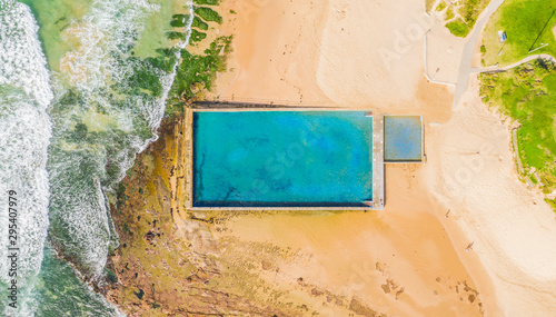 Photography Aerial top down view of a beach pool