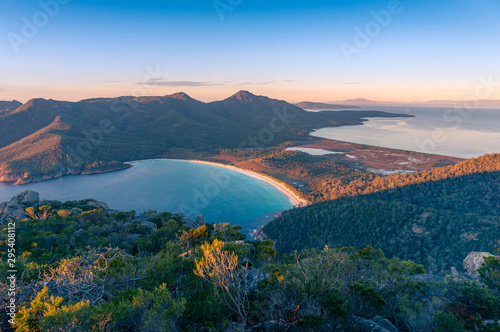 Sunrise nature landscape of beautiful bay and mountains. Wineglass bay Tasmania