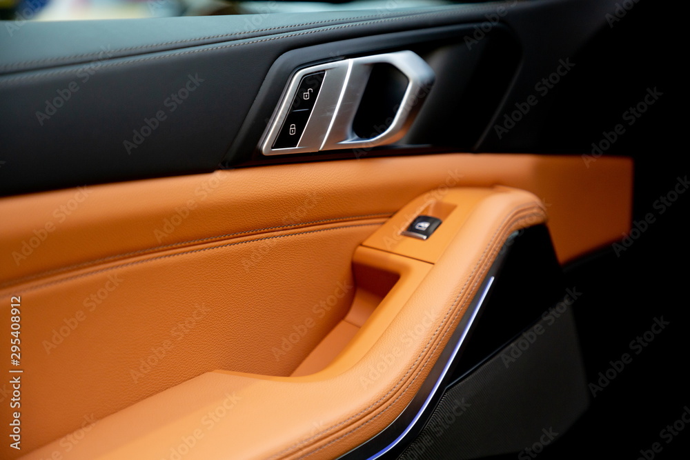 brown luxury leather car door handle modern design .