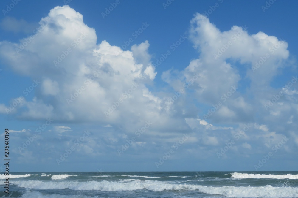 Beautiful sky and clouds view over the ocean on Atlantic coast of North Florida