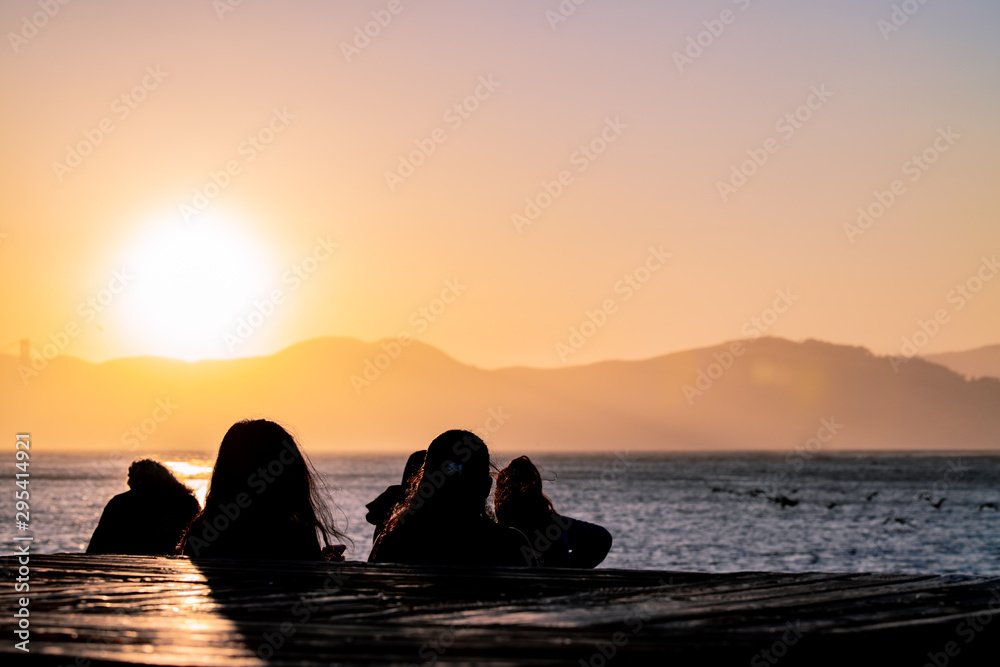 Sunset Watchers silhouette west coast