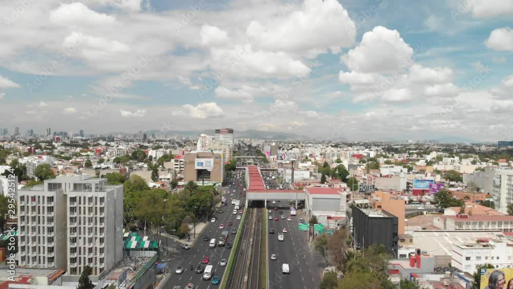Aerial panoramic view of southern Mexico City and the traffic in Calzada de Tlalpan. Drone hovering Aerial panoramic view of southern Mexico City and the traffic in Calzada de Tlalpan. Drone hovering
