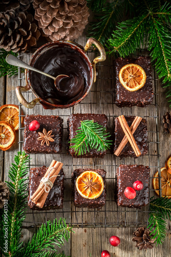 Fototapeta Naklejka Na Ścianę i Meble -  Tasty and homemade Gingerbread cubes for Christmas with chocolate glaze