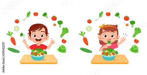 cute happy kids eat salad vegetable fruits