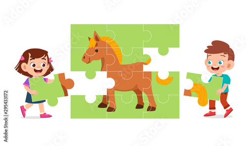 happy cute kids play solve puzzle together © Colorfuel Studio