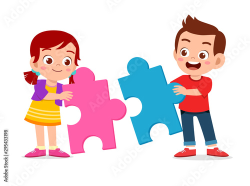 happy cute kids play solve puzzle together