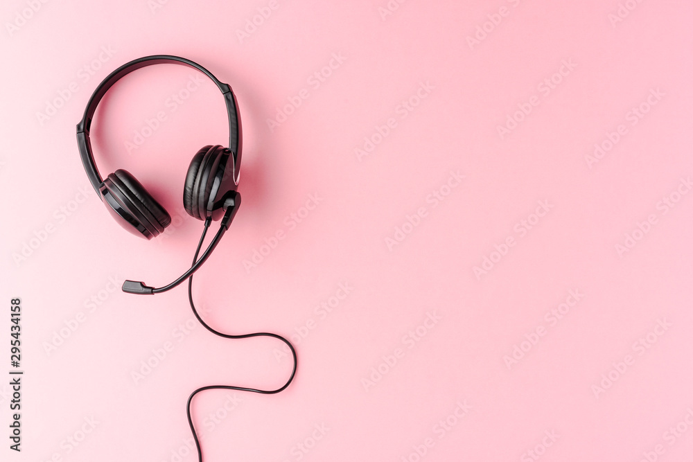 Overheadshot of headset on background with copyspace. Call center concept Overheadshot of headset on background with copyspace. Call center concept