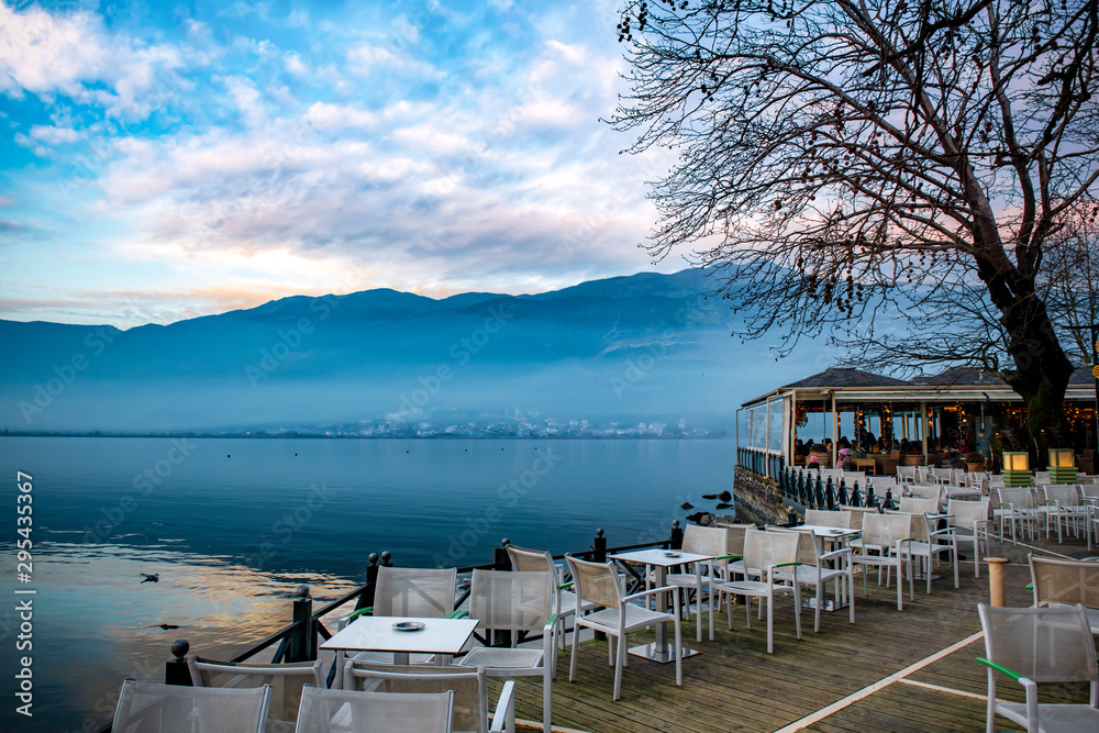 Fototapeta premium View to lake Pamvotis in a foggy day at sunset, Greece
